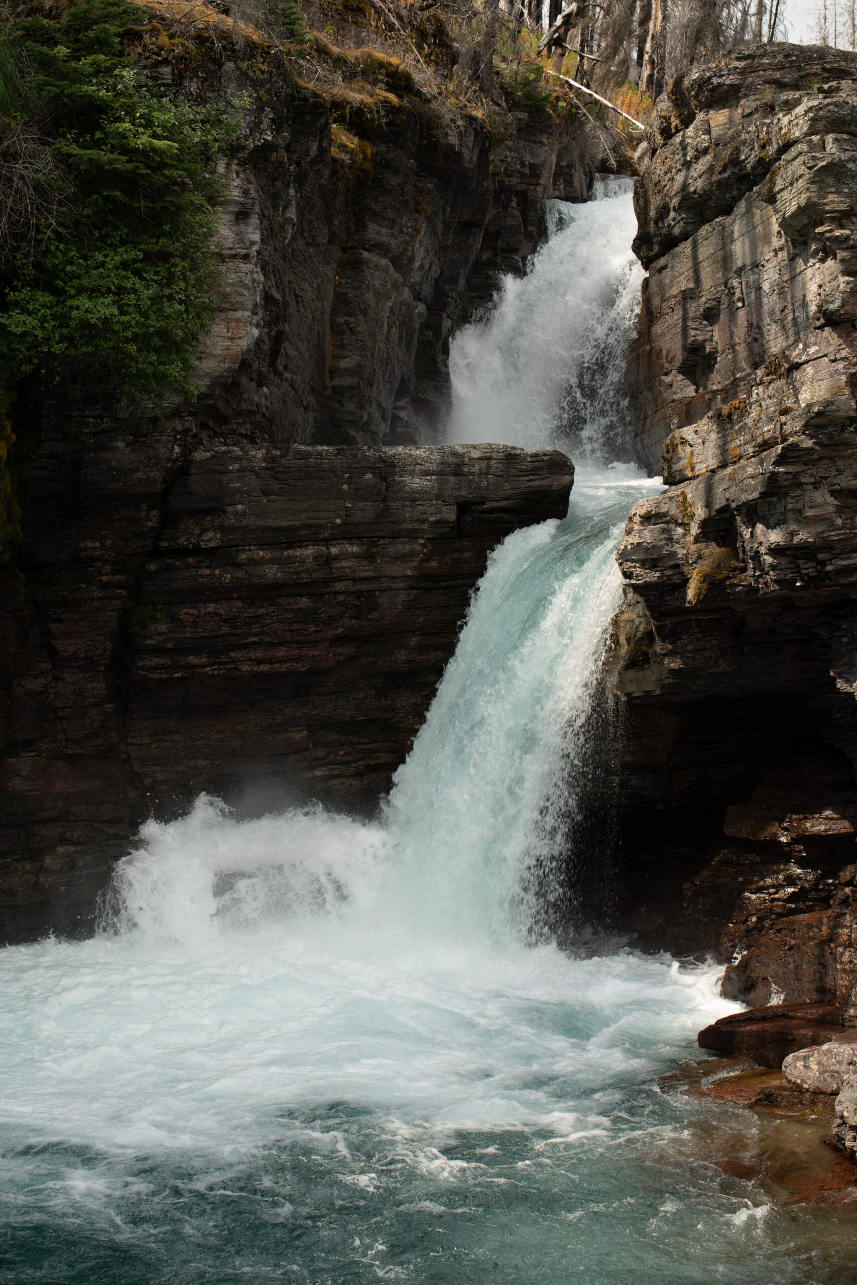 a waterfall in a rocky area