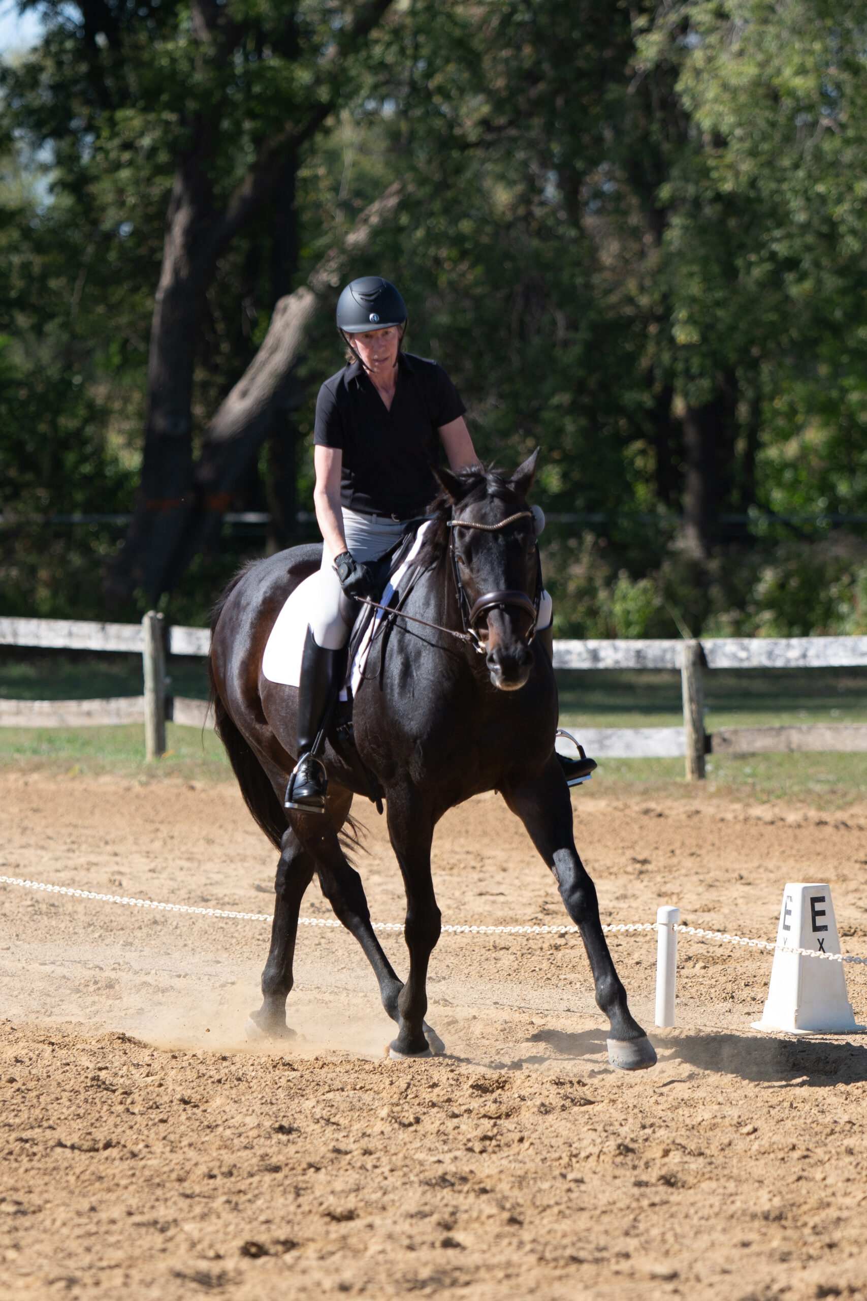 a woman riding a horse